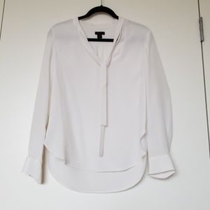 White shirt with bow tie